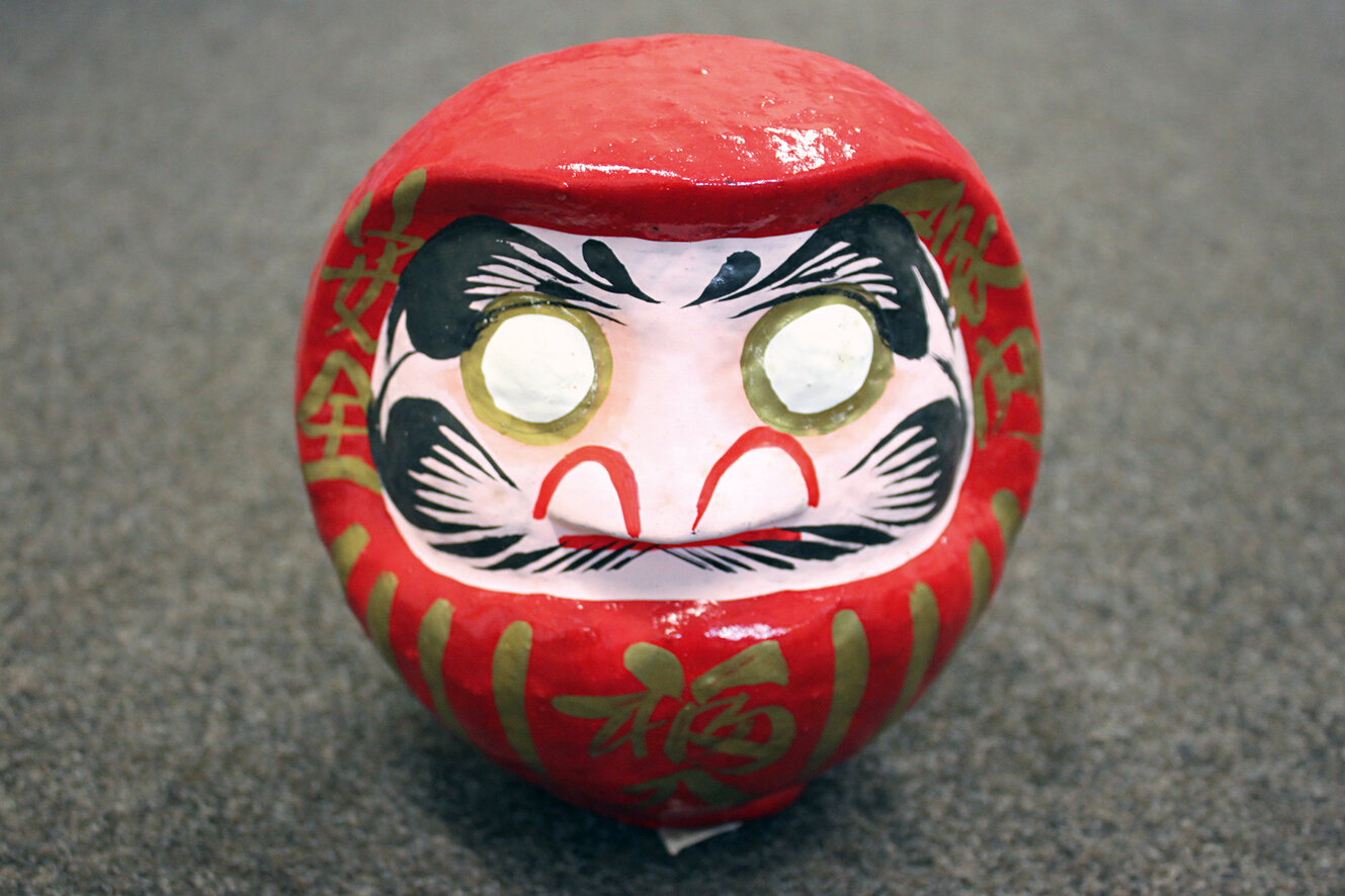 Daruma als Glücksbringer